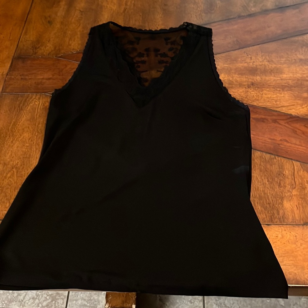 Women’s Black shirt, size large. Only wore one time